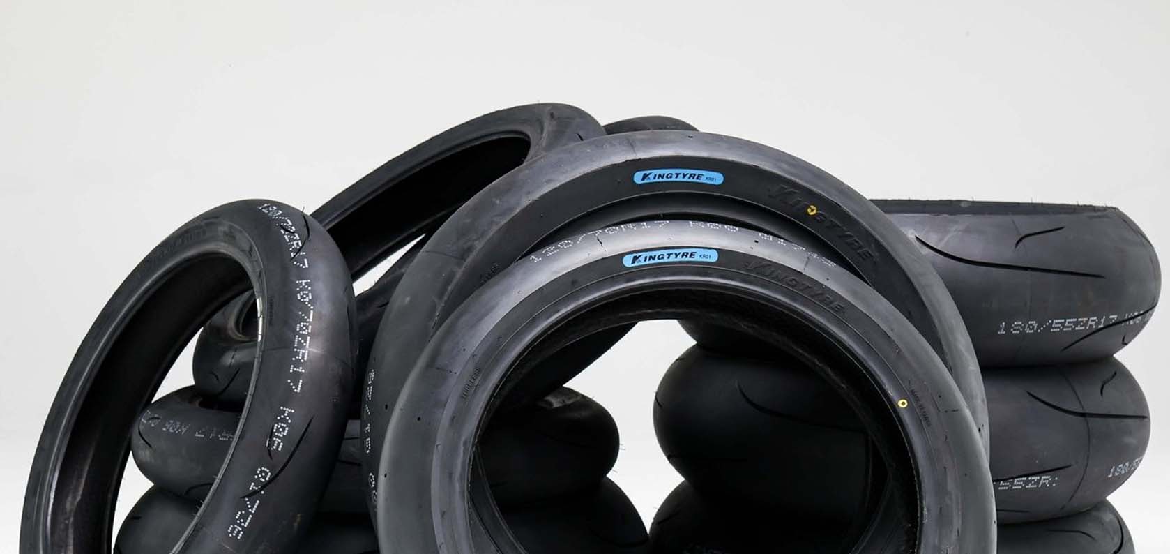 Kingtyre K06 semi slick tires showing four different tread compounds (hard, medium, soft, ultra-soft)